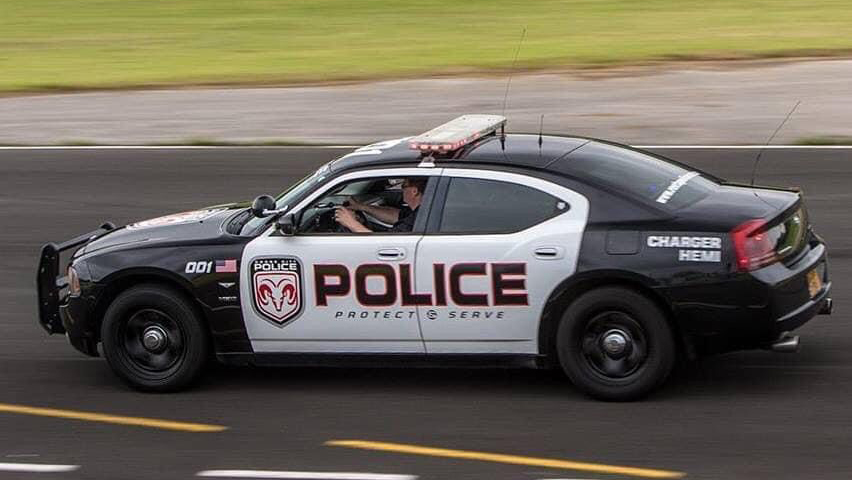 Left side view of american police car Dodge Charger