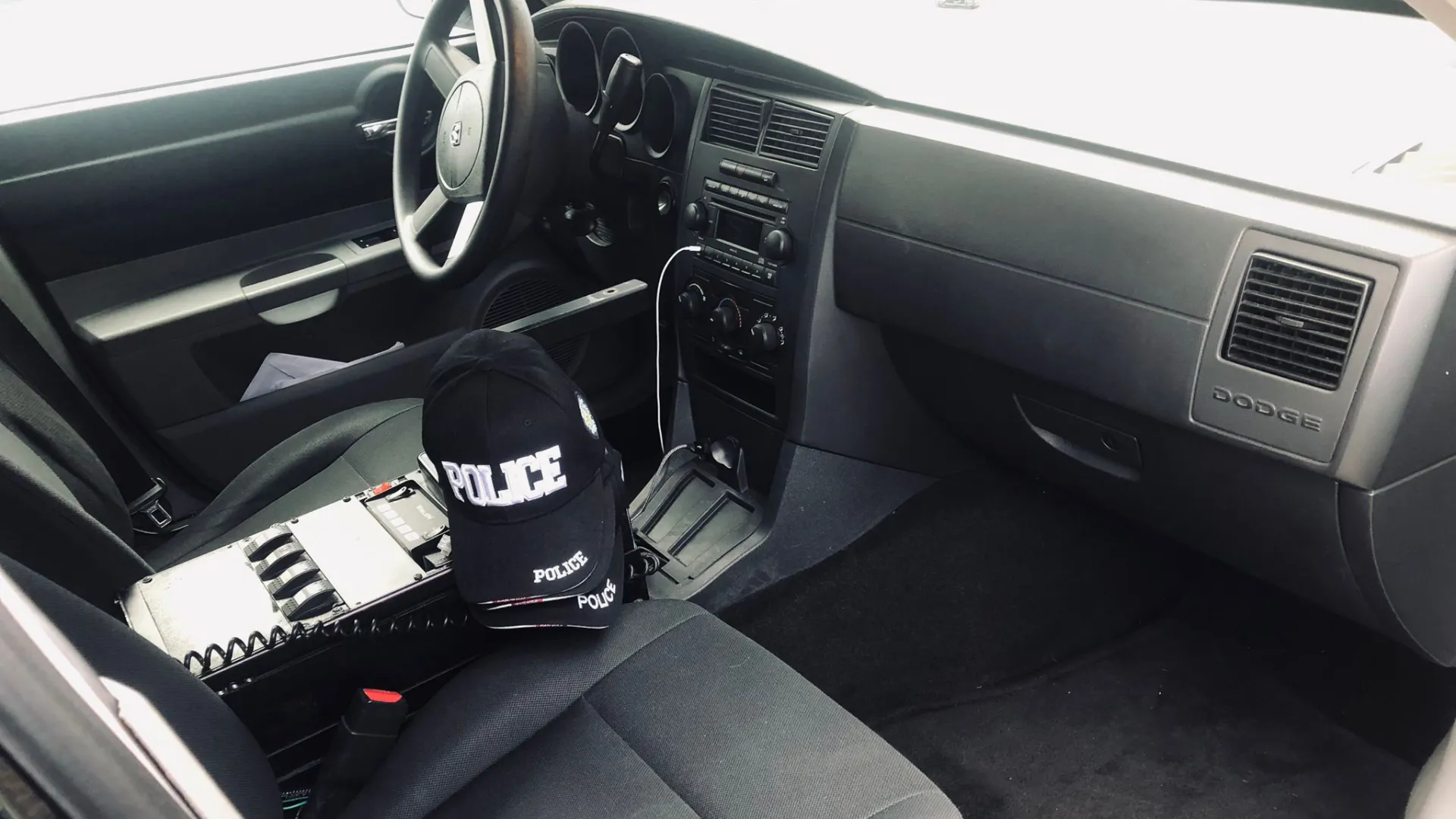 front passenger seat inside Dodge Charger Police car