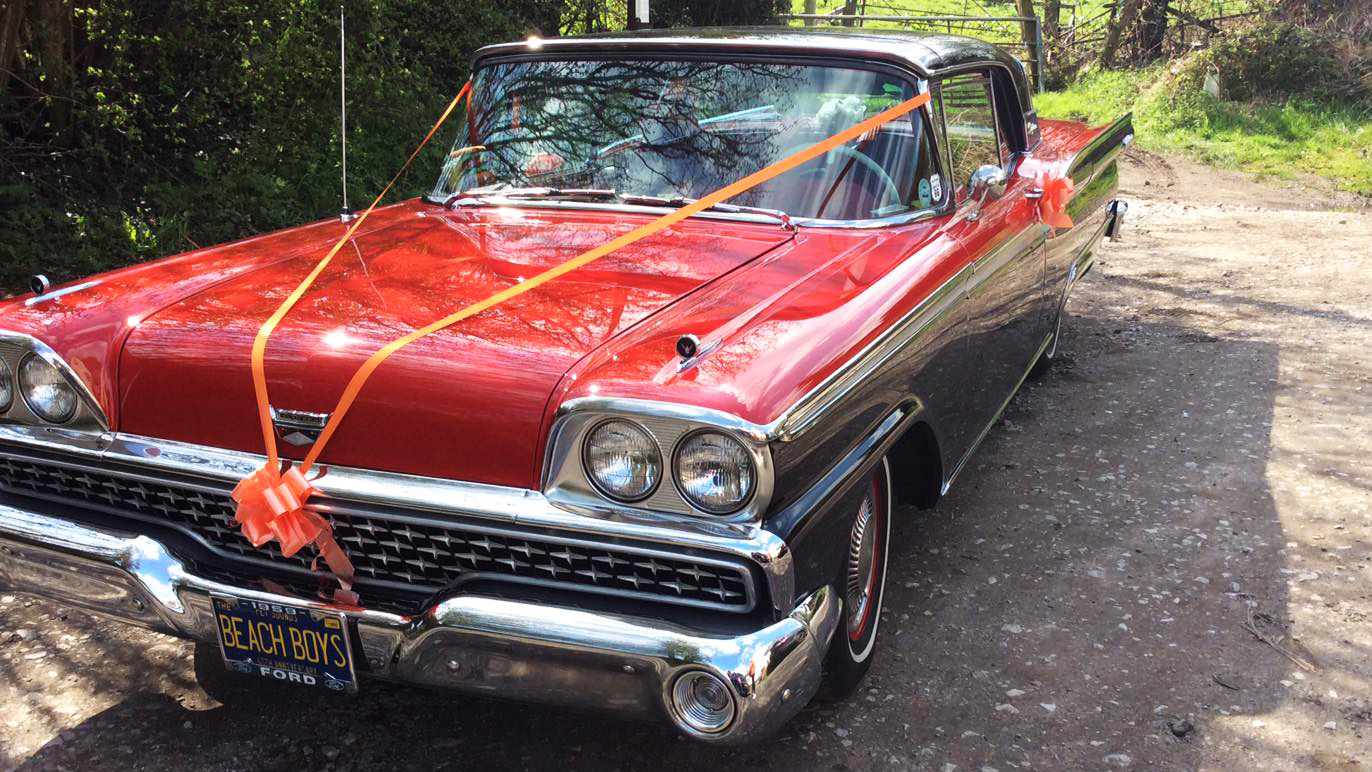 Front view of classic american ford fairlane with Orange ribbons