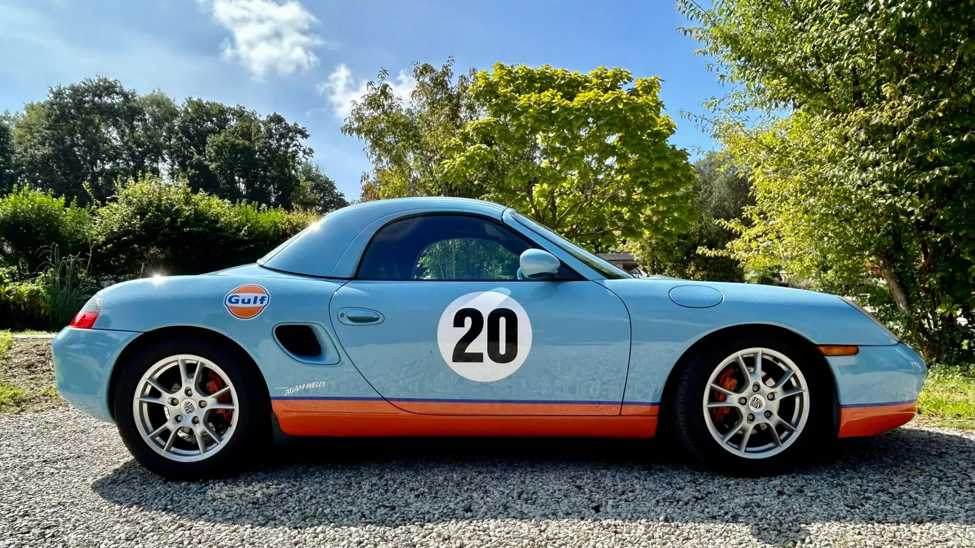 Right Side view of Porsche Boxster with Number 20 logo on the side