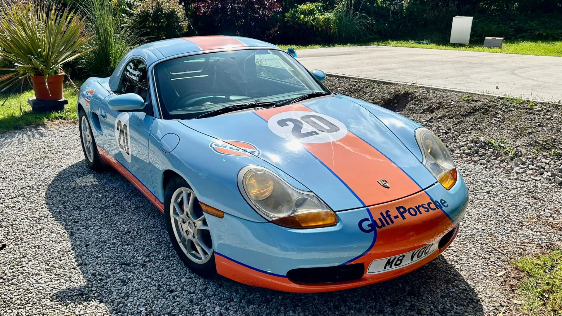 Aerial Front view of Porsche Boxster Gulf Livery in Light Blue and Orange