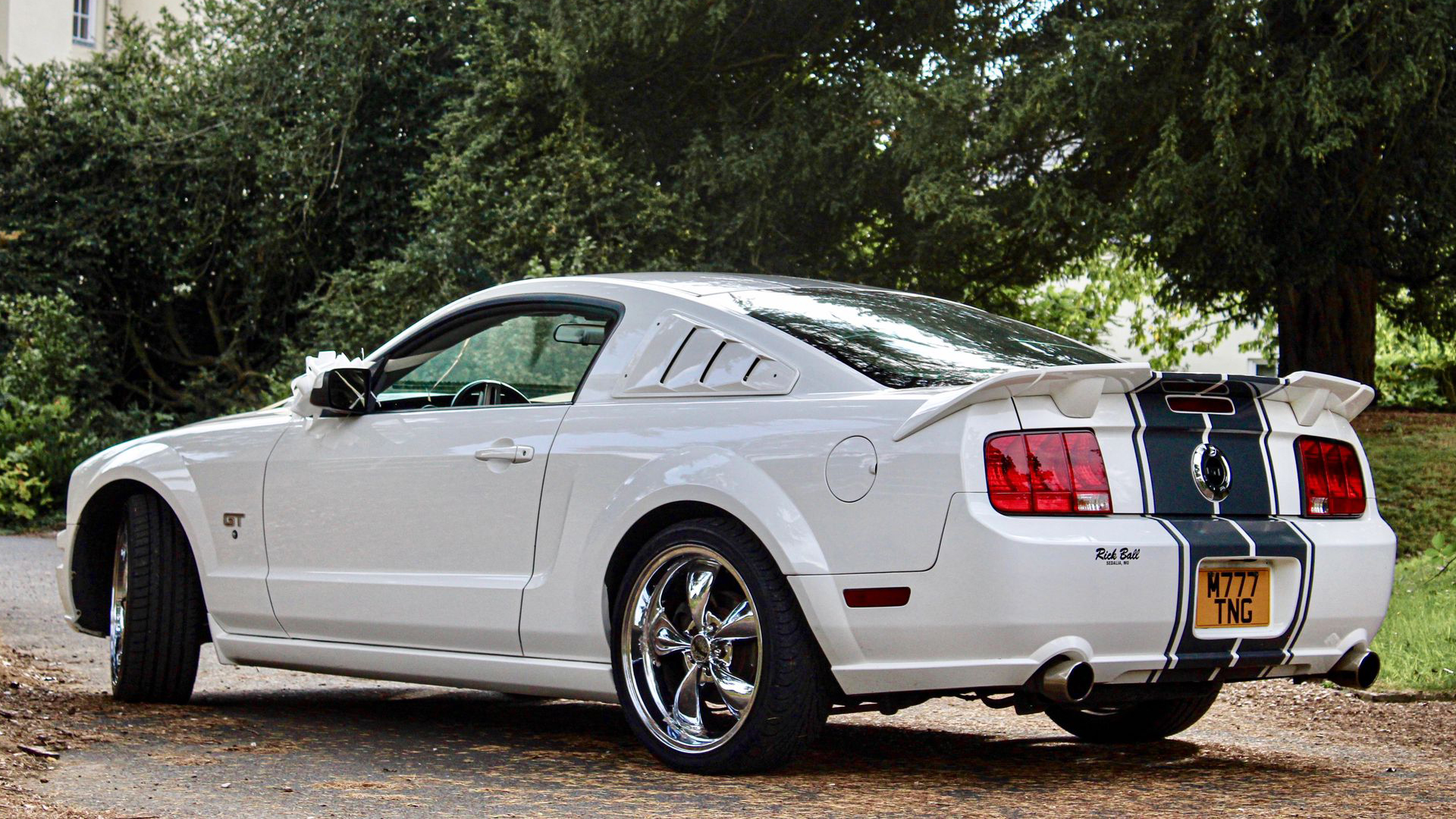 Rear left side view of Modern Ford Mustang Gt