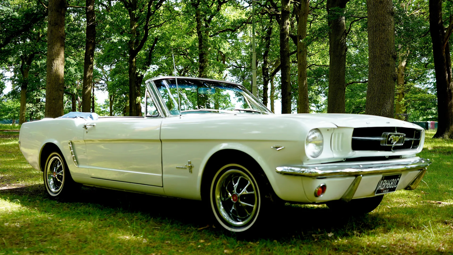 Right side white ford mustang convertible