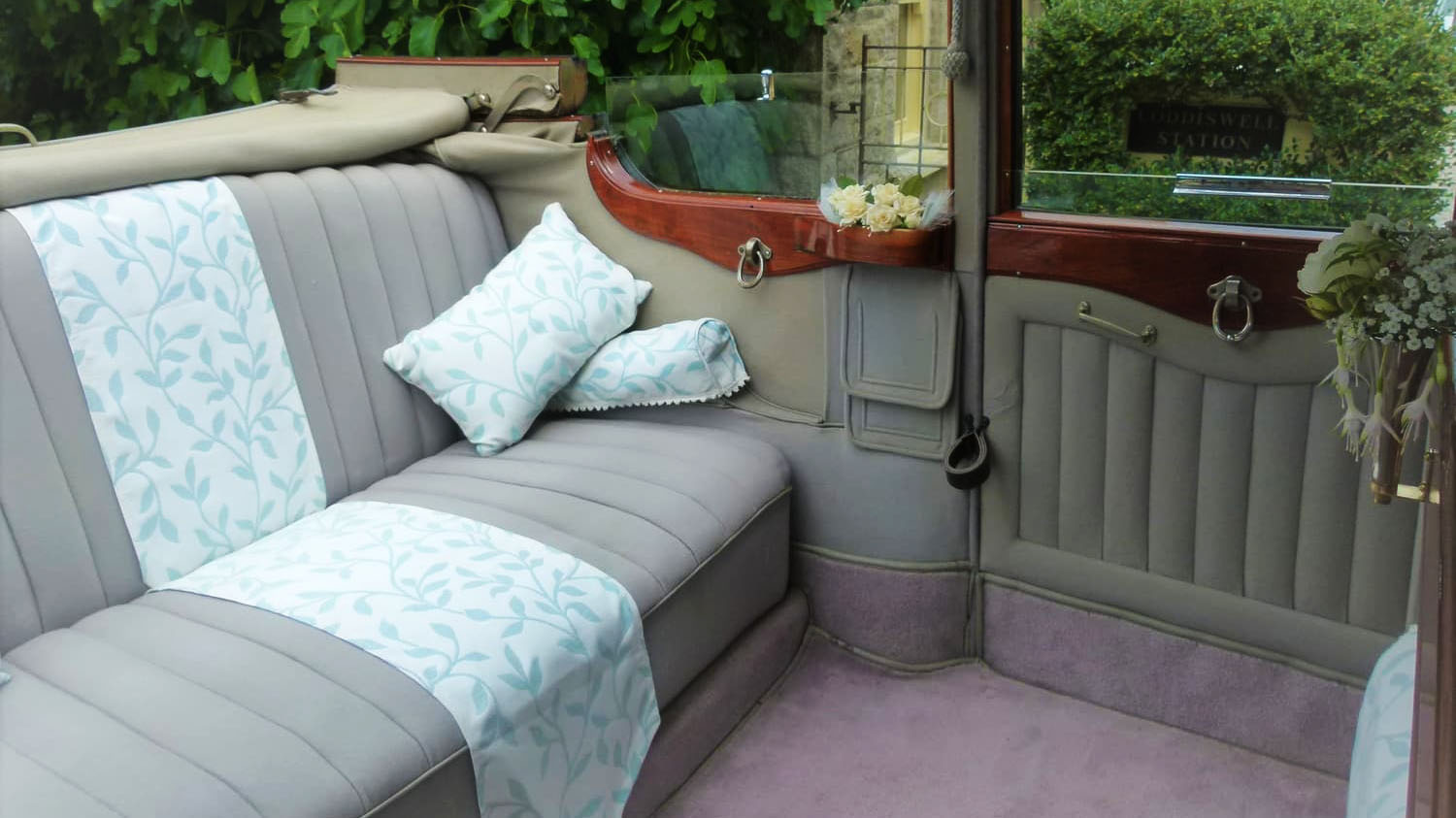 Rear bench seats in Silver inside  Vintage Daimler.