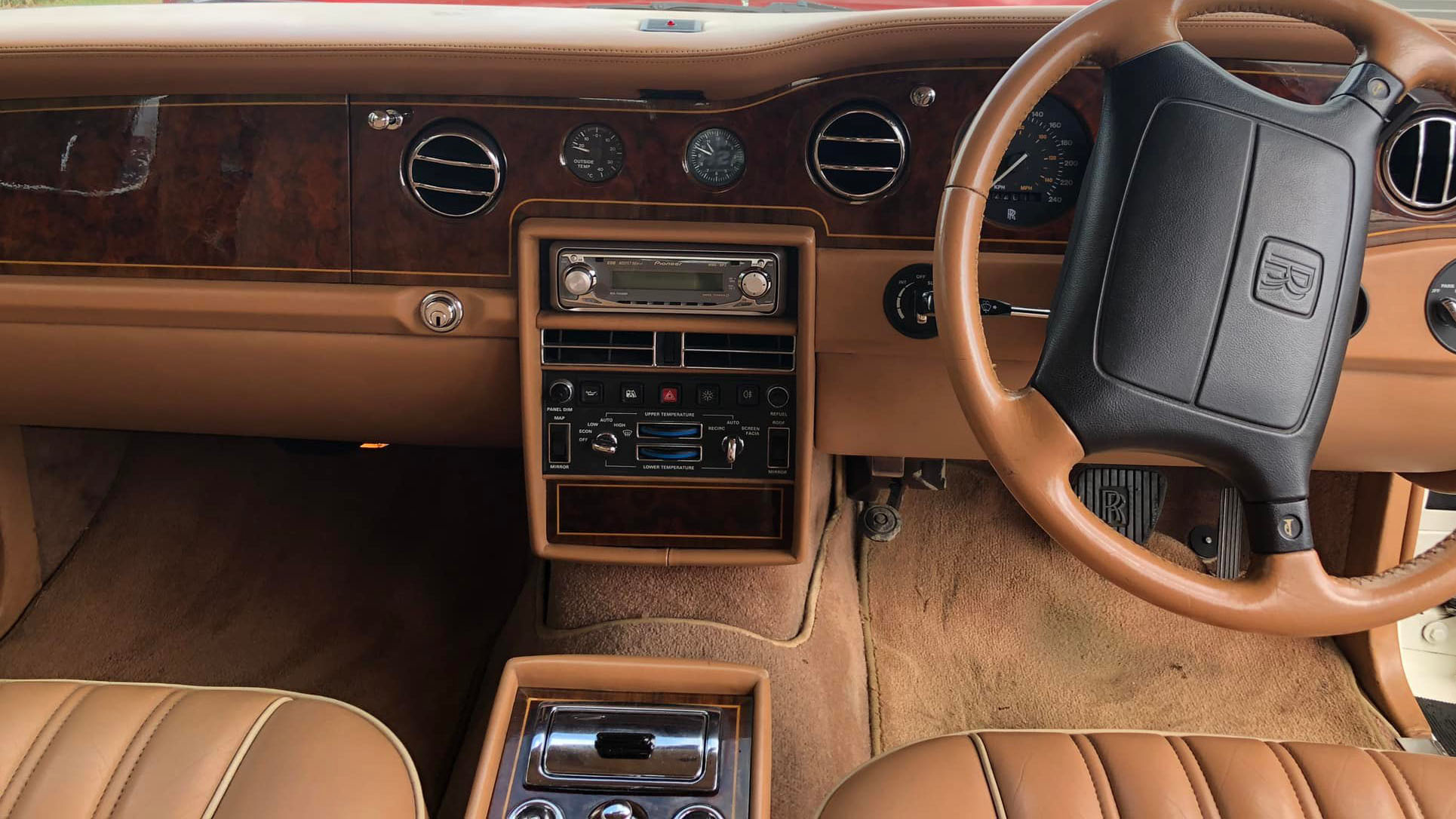 interior front wooden dashboard inside a classic Rolls-Royce Silver Spirit