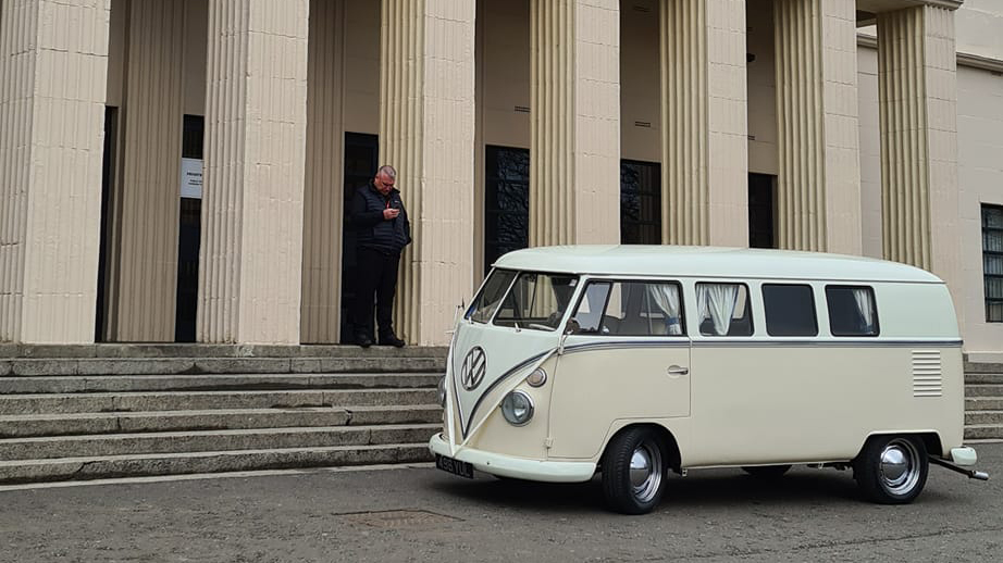 Classic VW Campervan in two tone Cream and White parked in front of Registrar in Newcastle-Upon-tyne