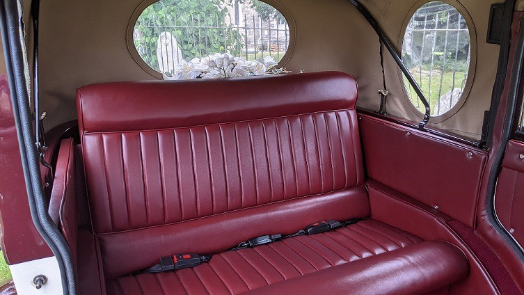 rear interior burgundy seat inside Badsworth wedding car