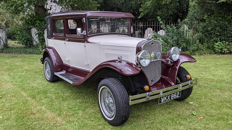 vintage Badsworth wedding car in Ivory with Burgundy wheel arches and roof