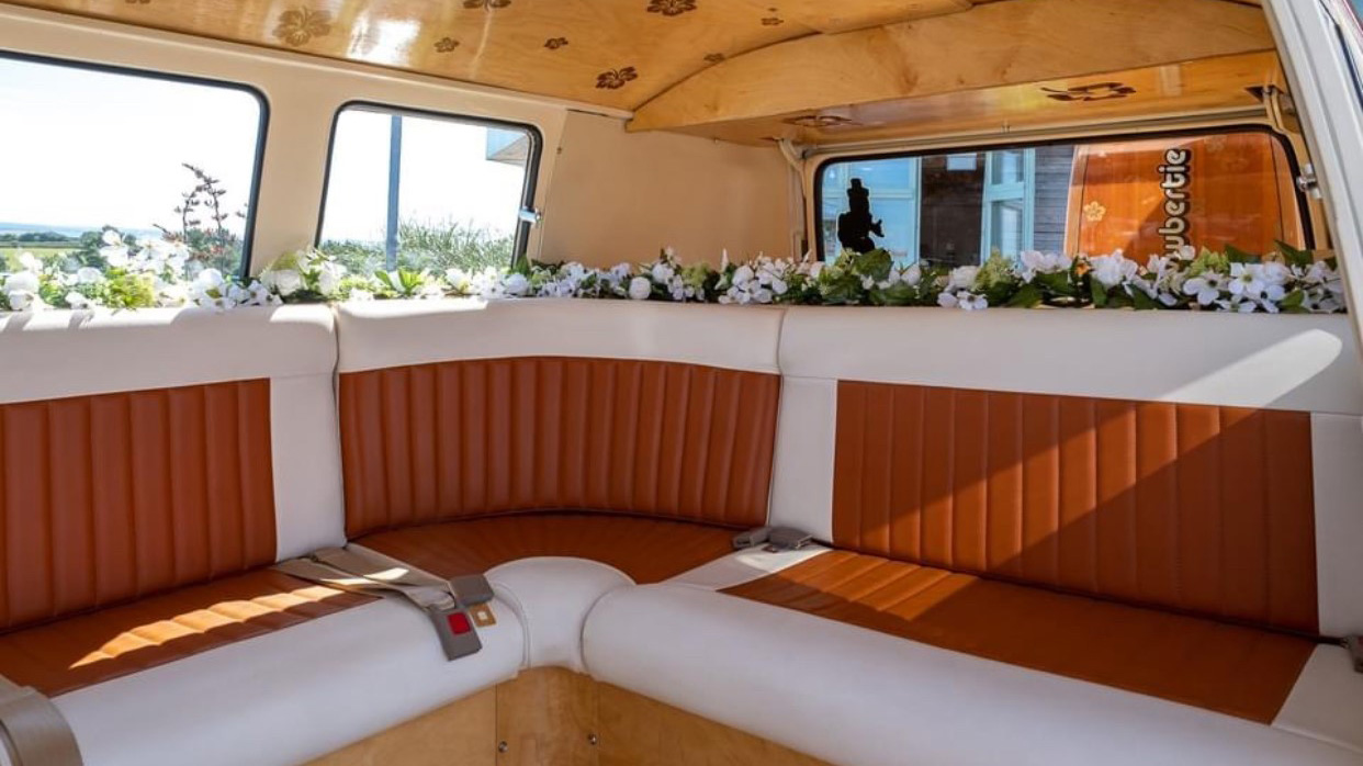 Classic VW campervan interior of Orange and White leather