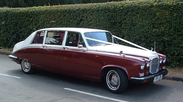 Right side view of Classic Daimler Limousine in two-tone Burgundy and White