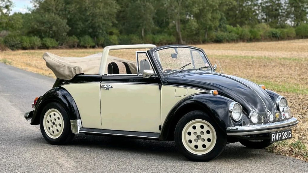 Black & Ivory Convertible Beetle  with Ivory wheel centre.