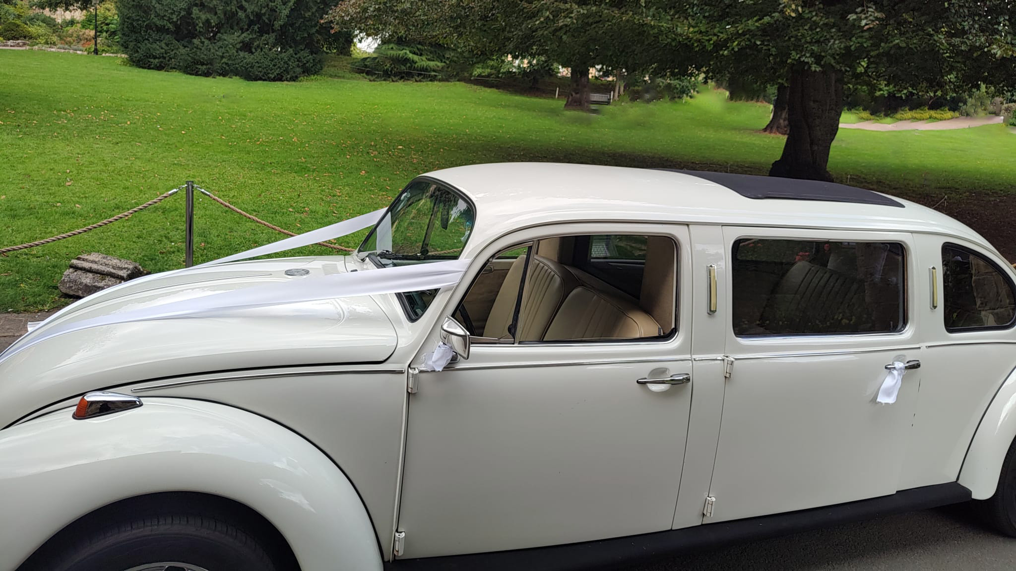 Left view of classic stretched VW beetle limousine with Sunroof