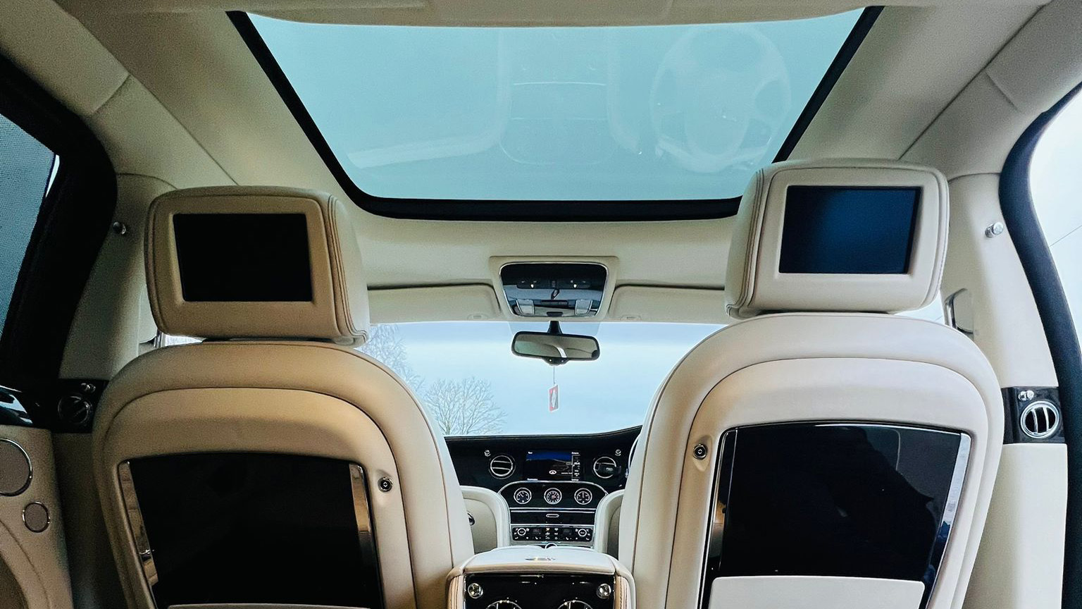 Cream leather interior in Bentley Mulsanne with large panoramic sunroof