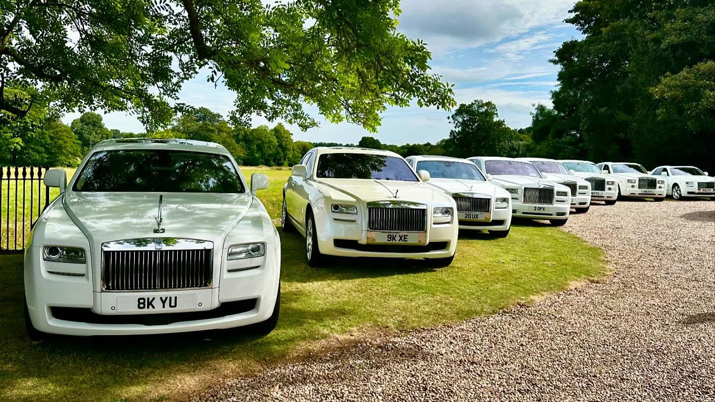 Fleet of Modern White Rolls-Royce in white on wedding duties