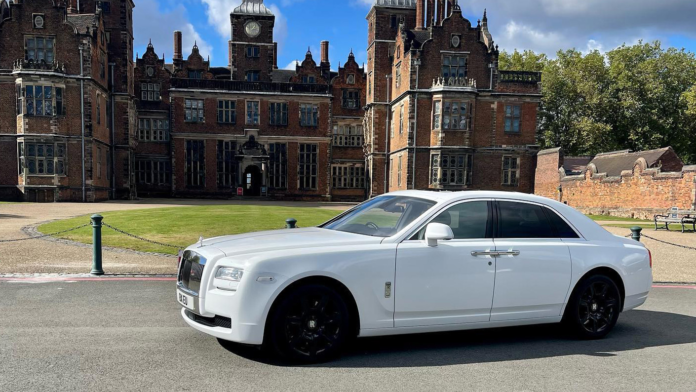 Left side view of white rolls-royce ghost at a popular Birmingham wedding venue