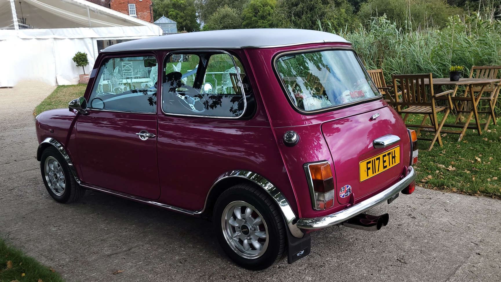 Rear View Classic Pink Austin Mini with white roof