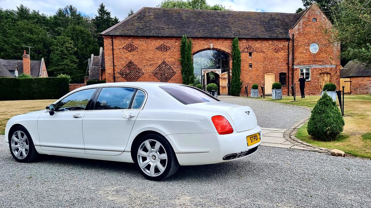 Modern White BEntley Rear view