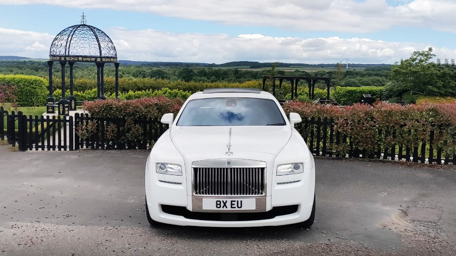 Front view of a white Modern Rolls-Royce Ghost