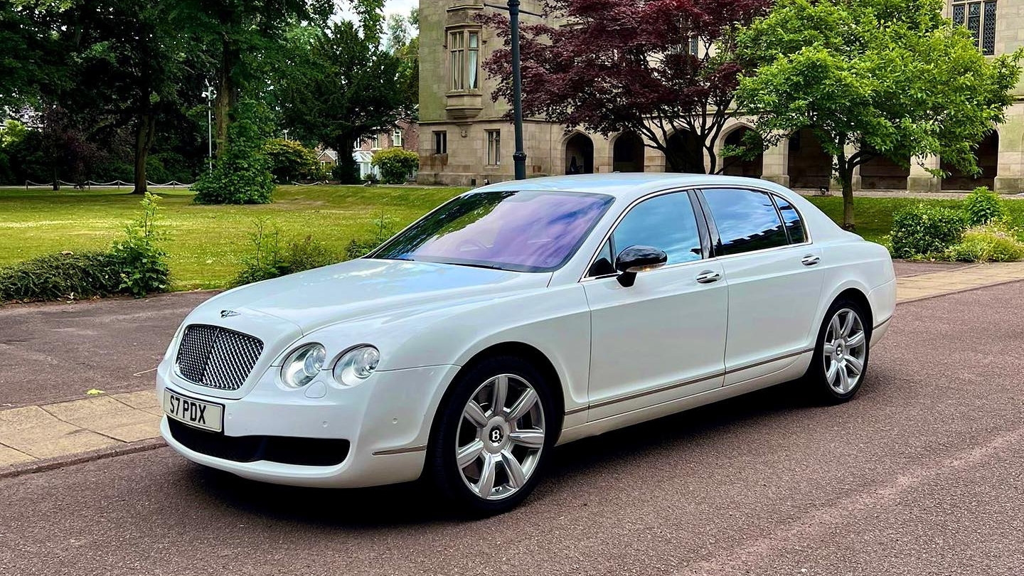 Left view of a Modern White Bentley Flying Spur