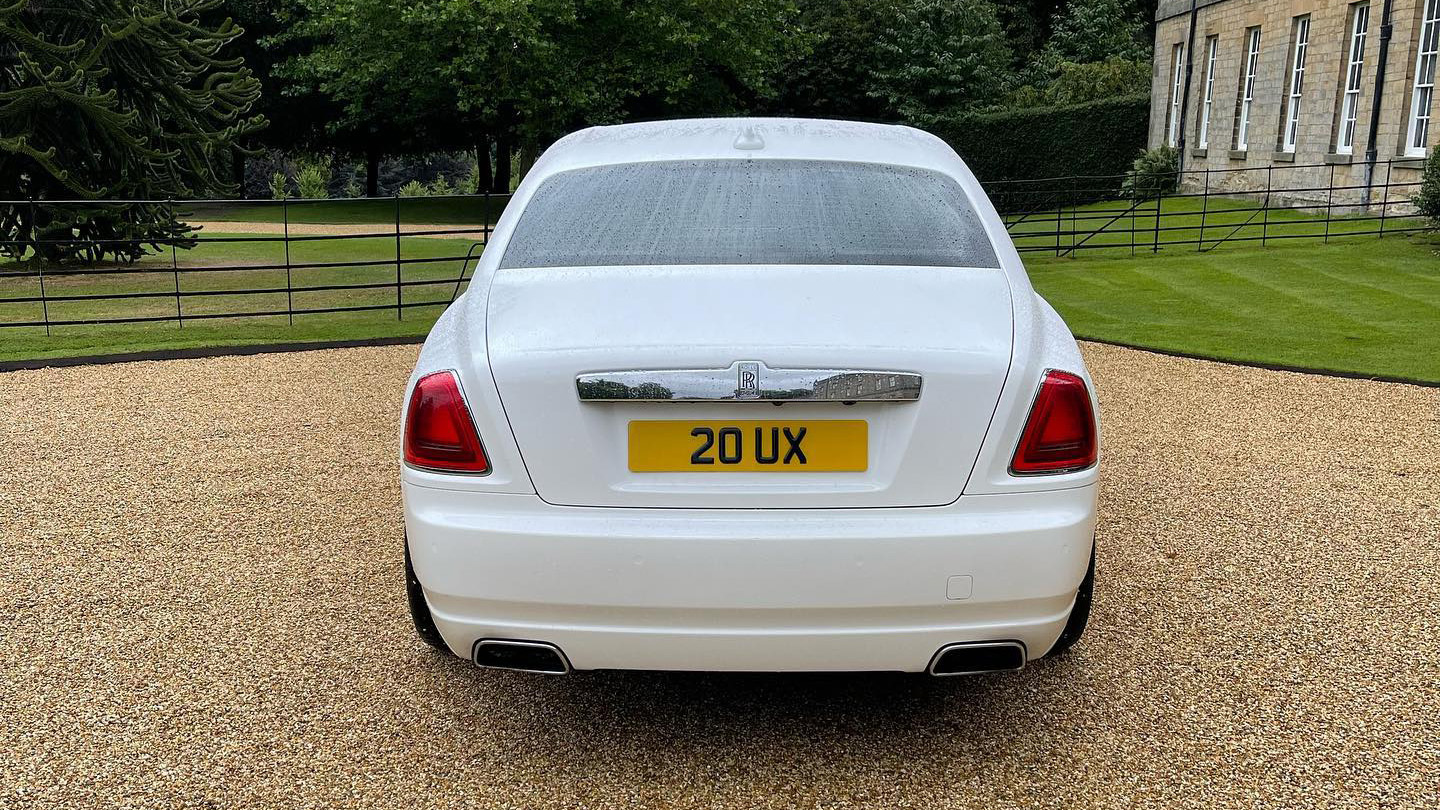 Full rear view of Rolls-Royce Ghost in white