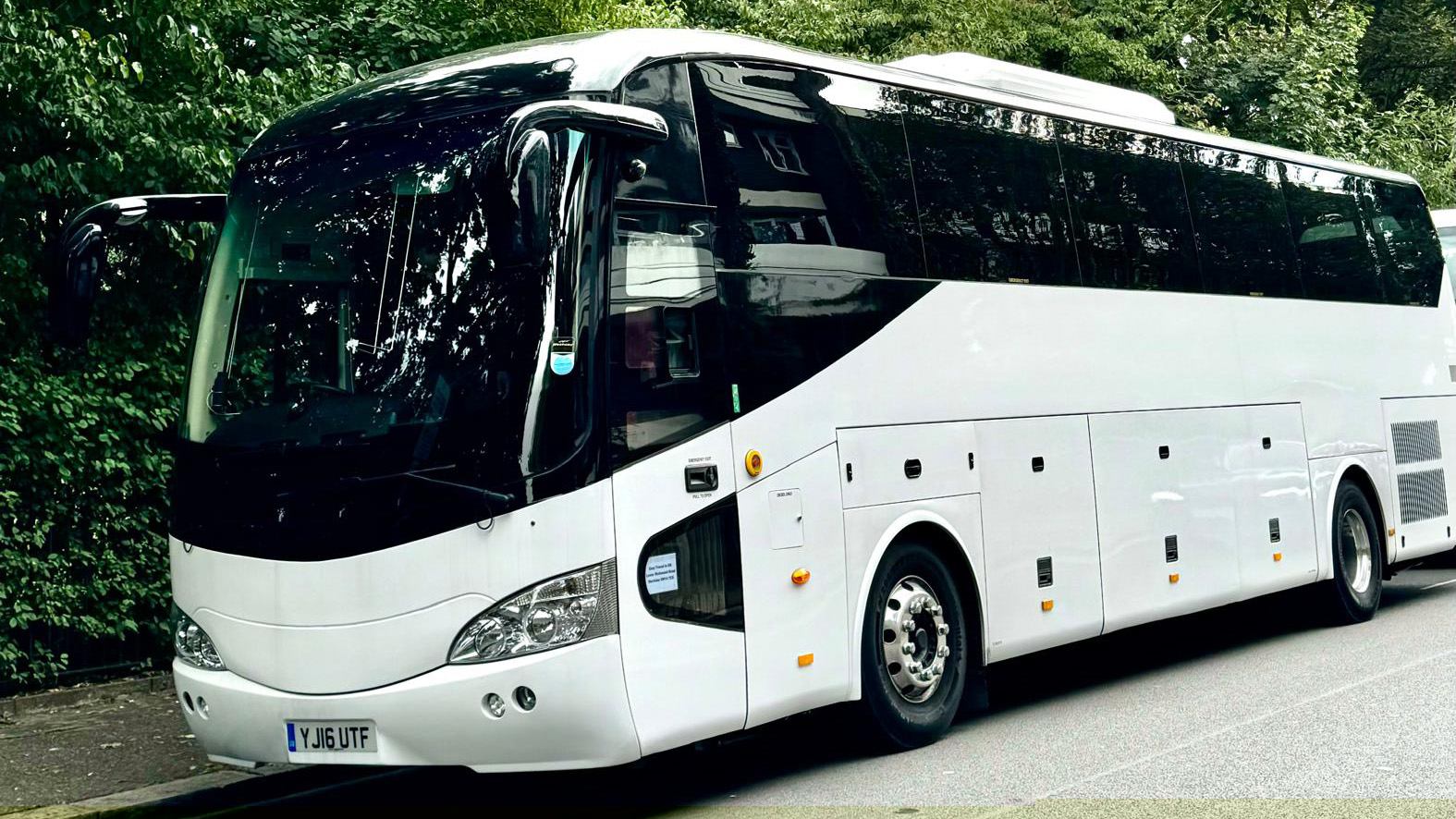 White Modern 55-seater coach for hire in London