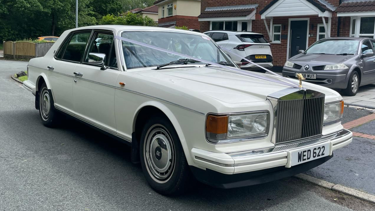 Classic White Rolls-Royce silver spirit