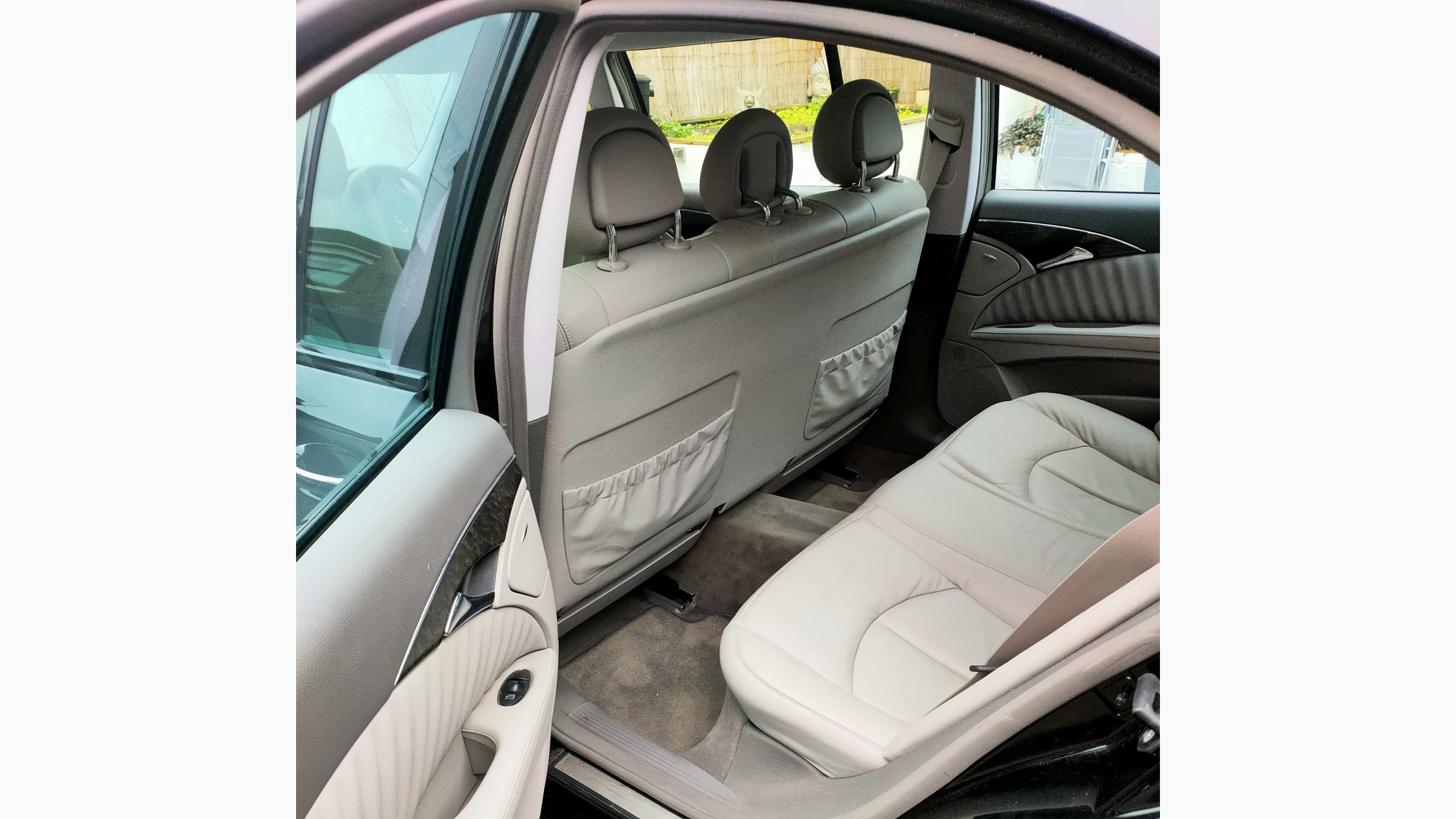 Rear bench forward facing bench seat inside a Mercedes E-class limo