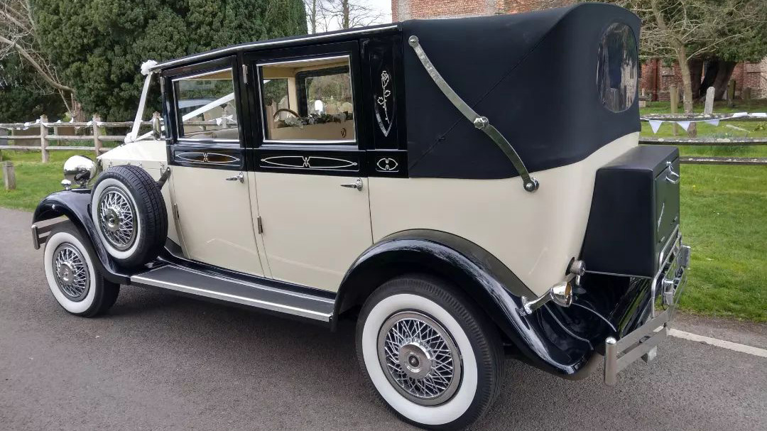 Rear view of Badsworth Landaulette with black soft top roof closed