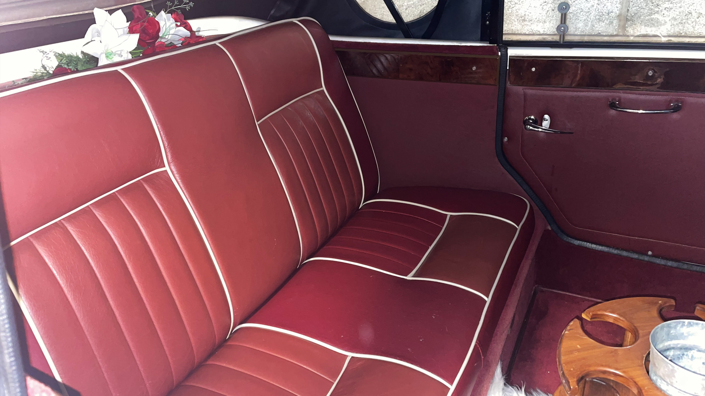 Rear interior bench seat inside Beauford in Maroon colour