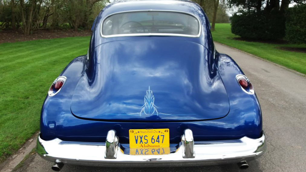 Oldsmobile Rocket 88 rear view with slopping rear boot and large chrome rear bumper