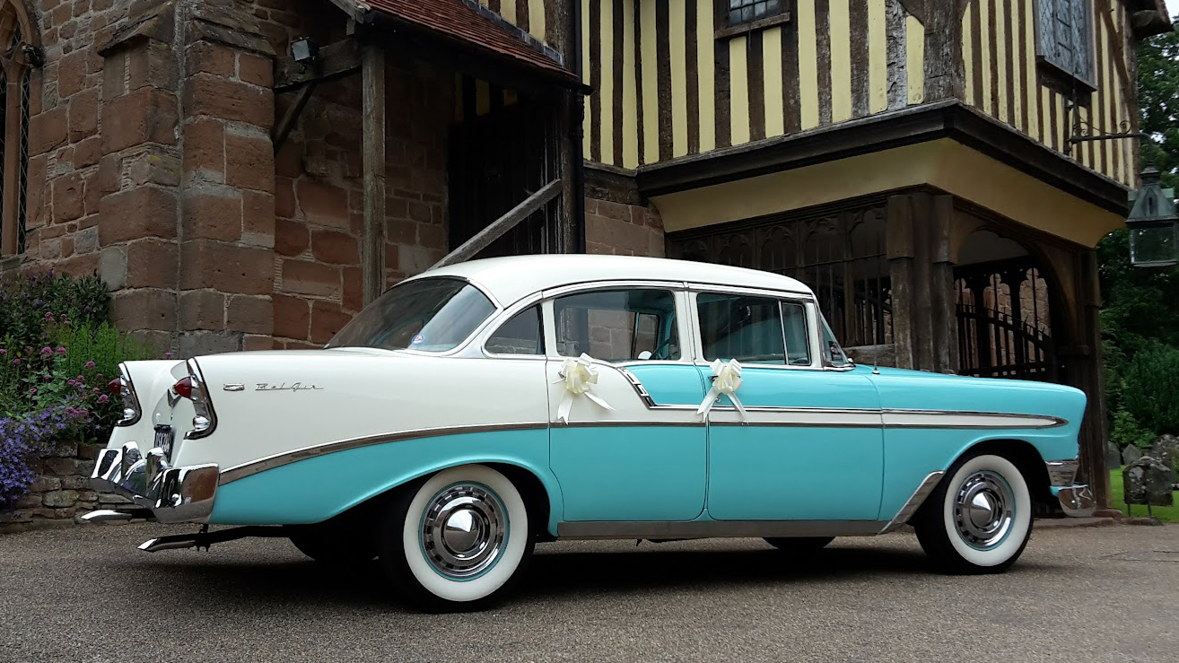 Right side view American Chevrolet BelAir decorated white white ribbons and bows