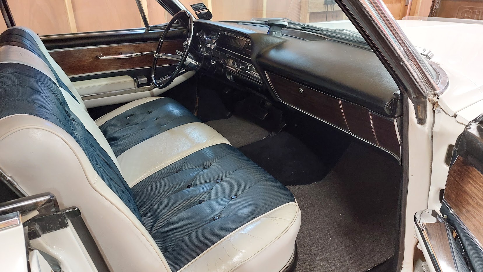 Front bench seat in Black and White inside Classic American