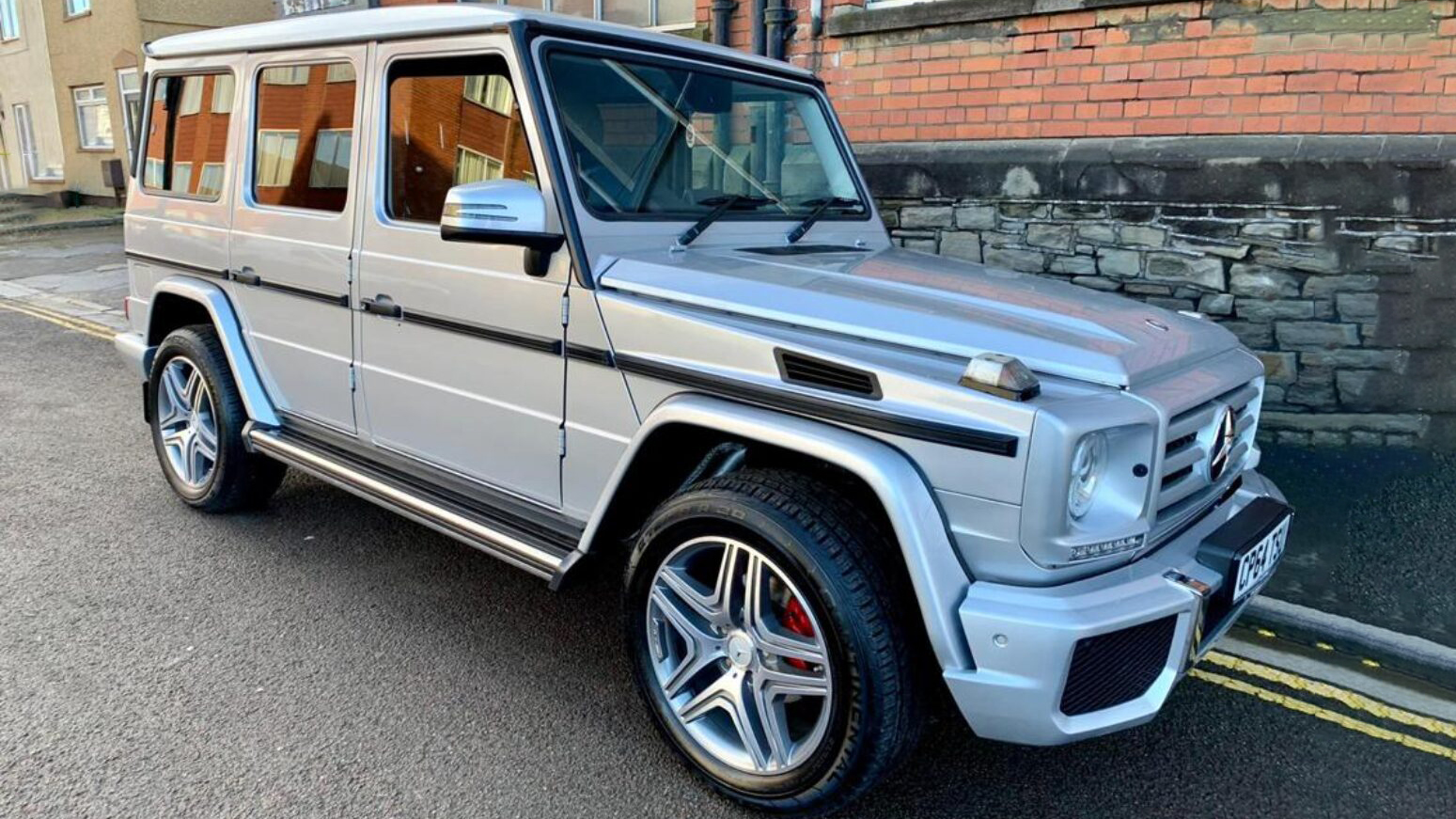 Silver Mercedes G-Wagon parked in the street of Bristol