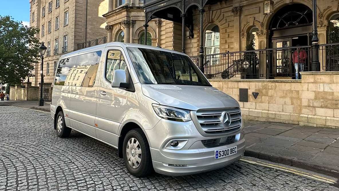 Silver Mercedes Minibus parked in the street of Bristol