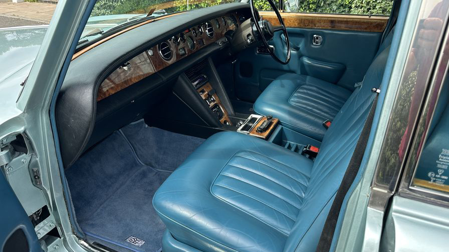 Rolls-Royce Silver Shadow front seat of blue leather with wooden dashboard