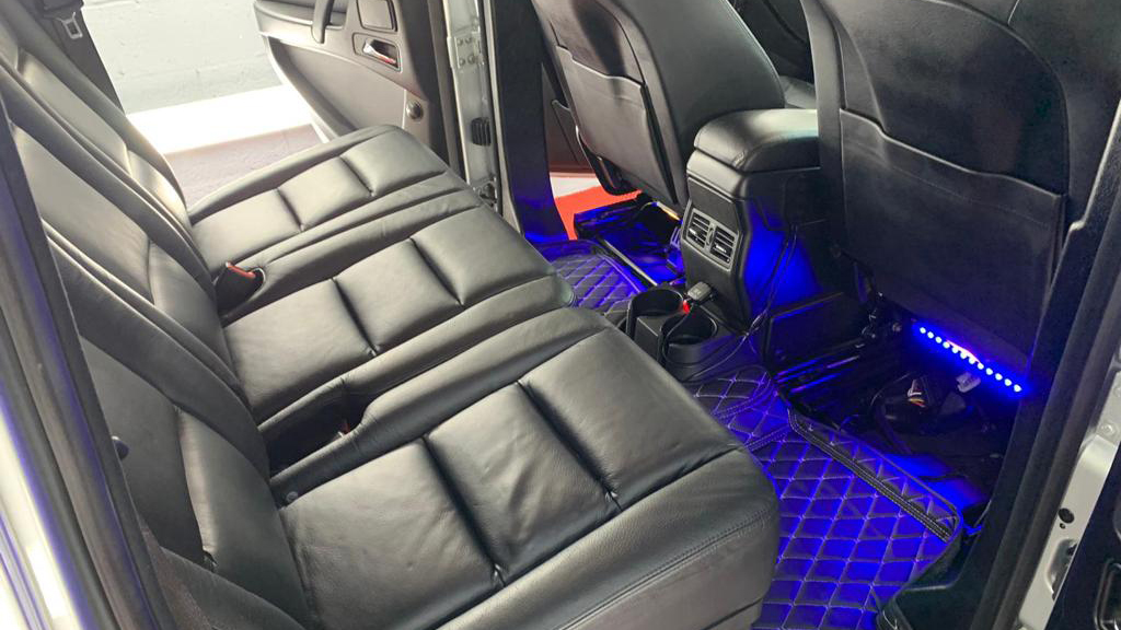 Black Leather rear interior inside Mercedes G-Wagon with illuminated blue LED lights