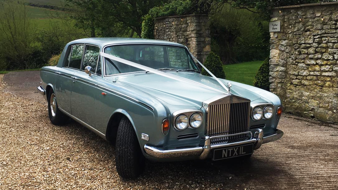 Rolls-Royce Silver Shadow front view of twin headlights, front chrome bumper and large chrome grill