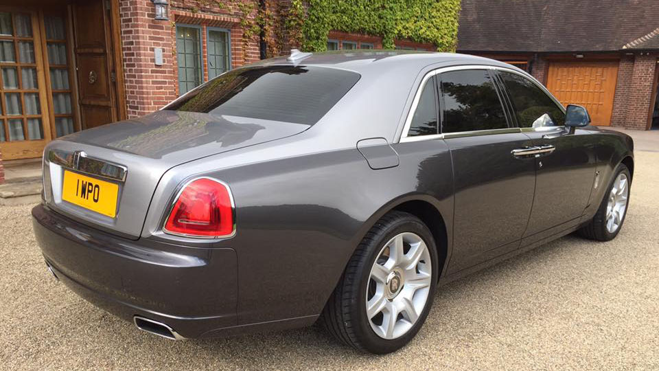 Rear view of a two-tone Rolls-Royce Ghost