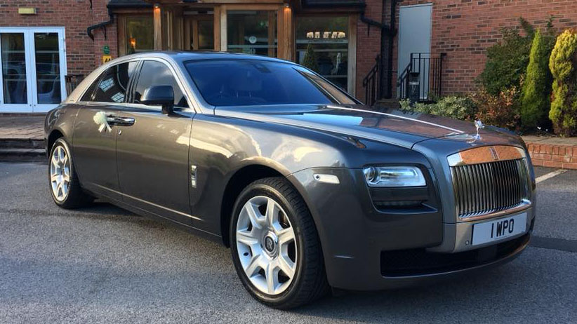 Rolls-Royce Ghost in Grey with silver bonnet and roof