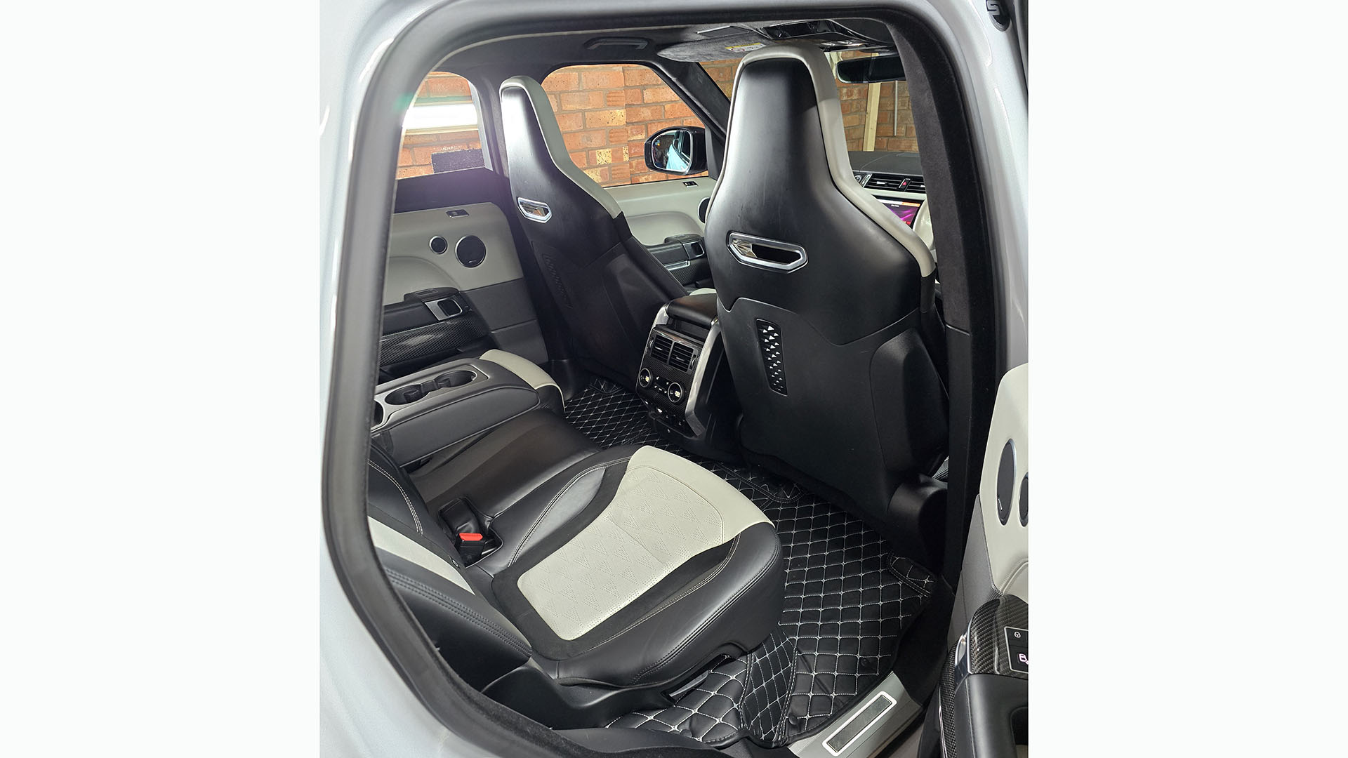 Black and Cream rear interior inside Range Rover