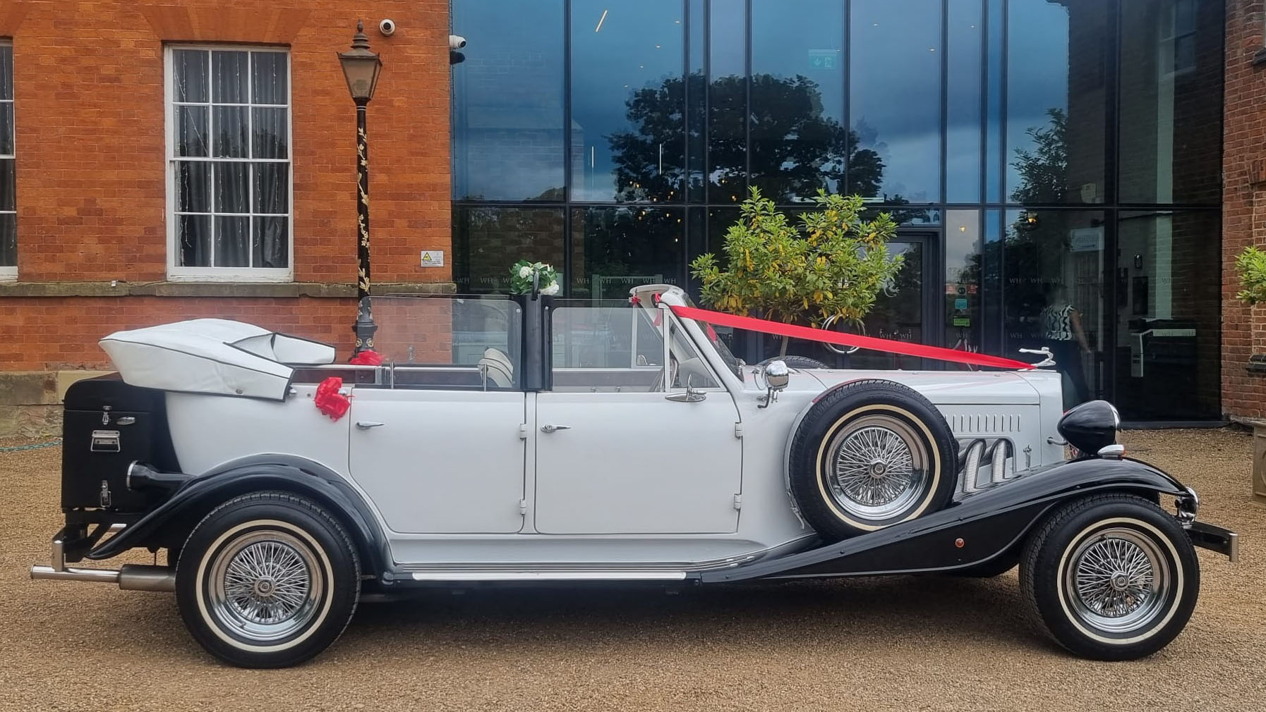 Right side view White Beauford with convertible roof open