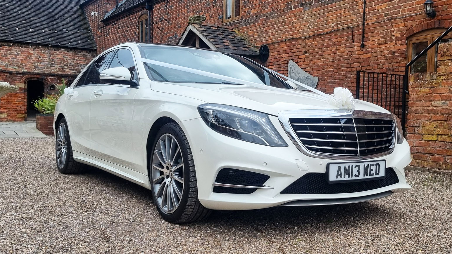 White Ribbons on a white Mercedes S-Class