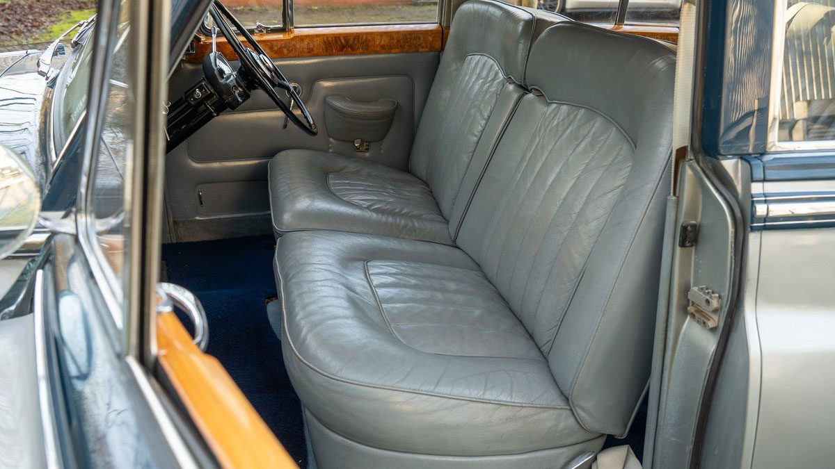 Front interior passenger seat in Silver Leather with royal blue carpet