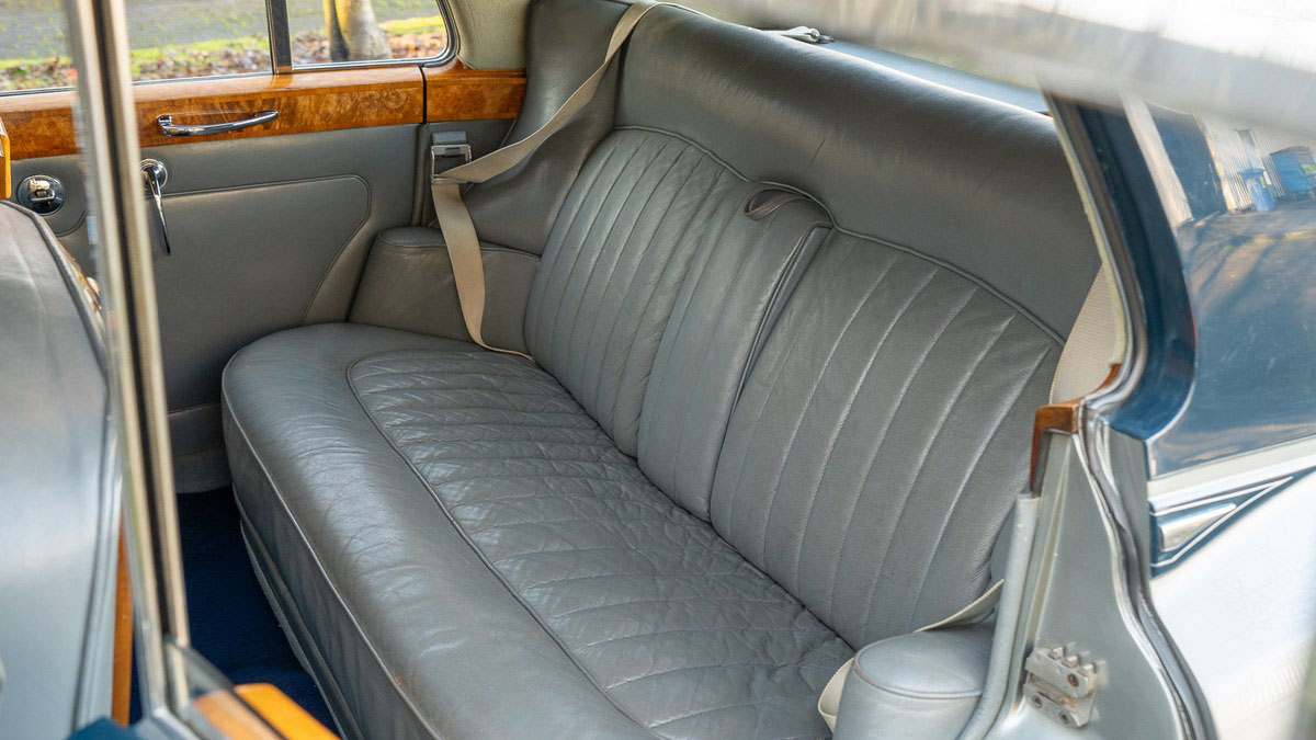 Rear silver leather bench seat inside Classic Rolls-Royce