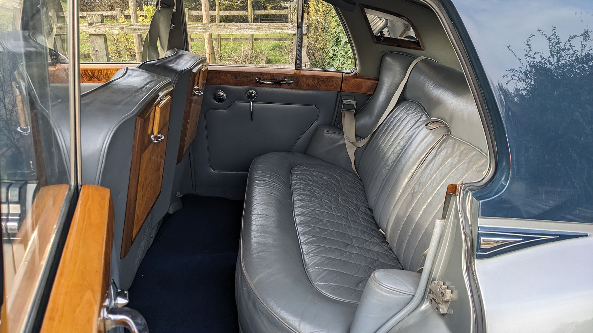 Rear interior inside Rolls-Royce showing the large legroom