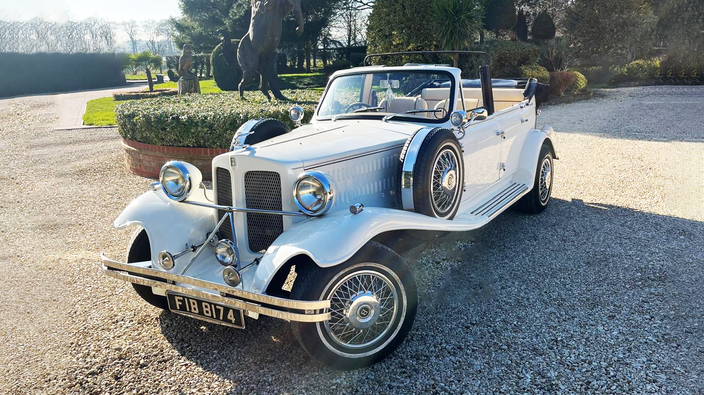 Vintage Beauford Wedding Car Hire with fully convertible roof open