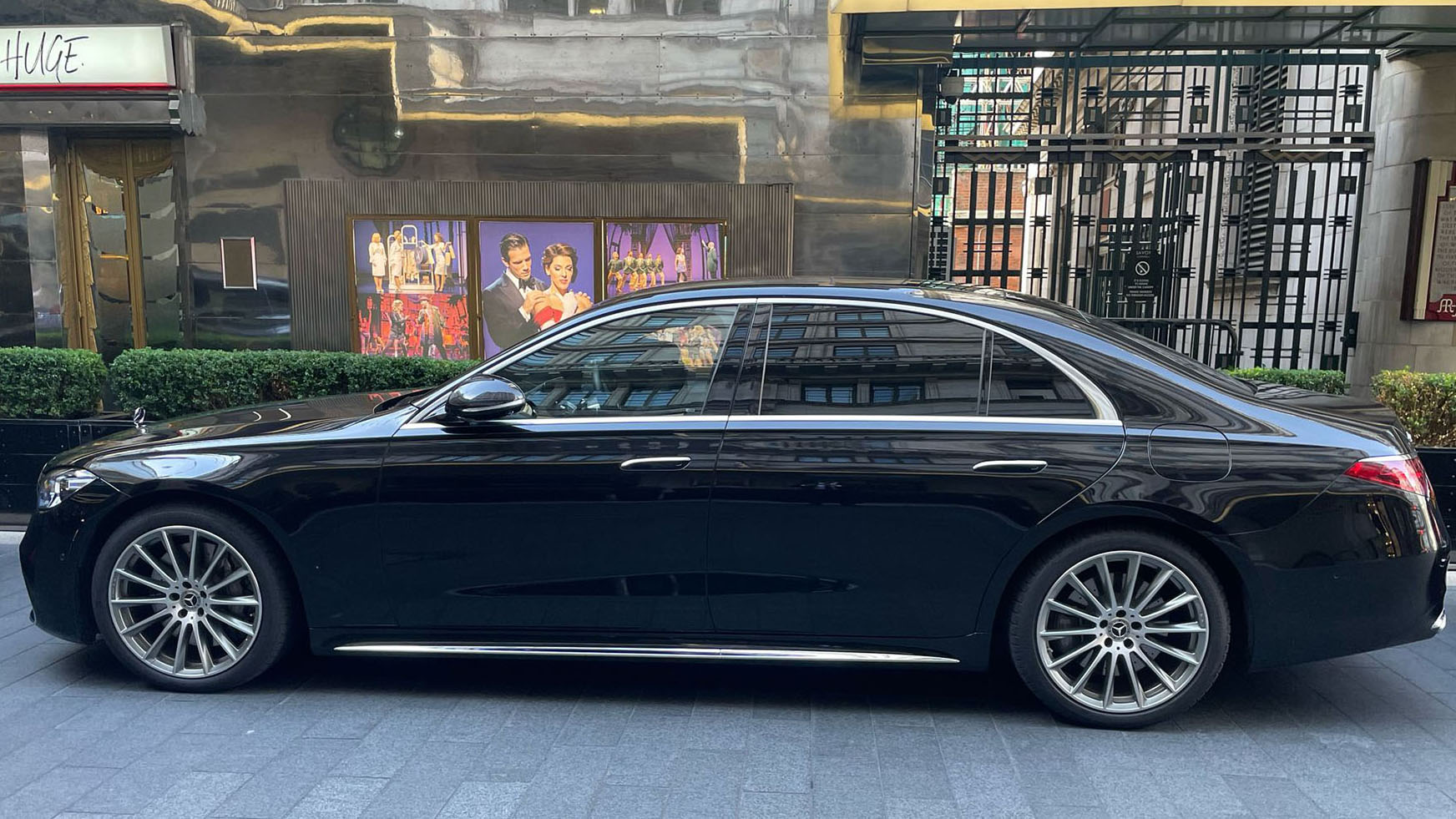 Left side view of Black Mercedes parked in street of London