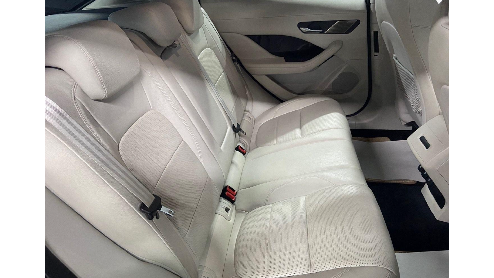 Rear interior cream leather seats inside a Jaguar I-Pace