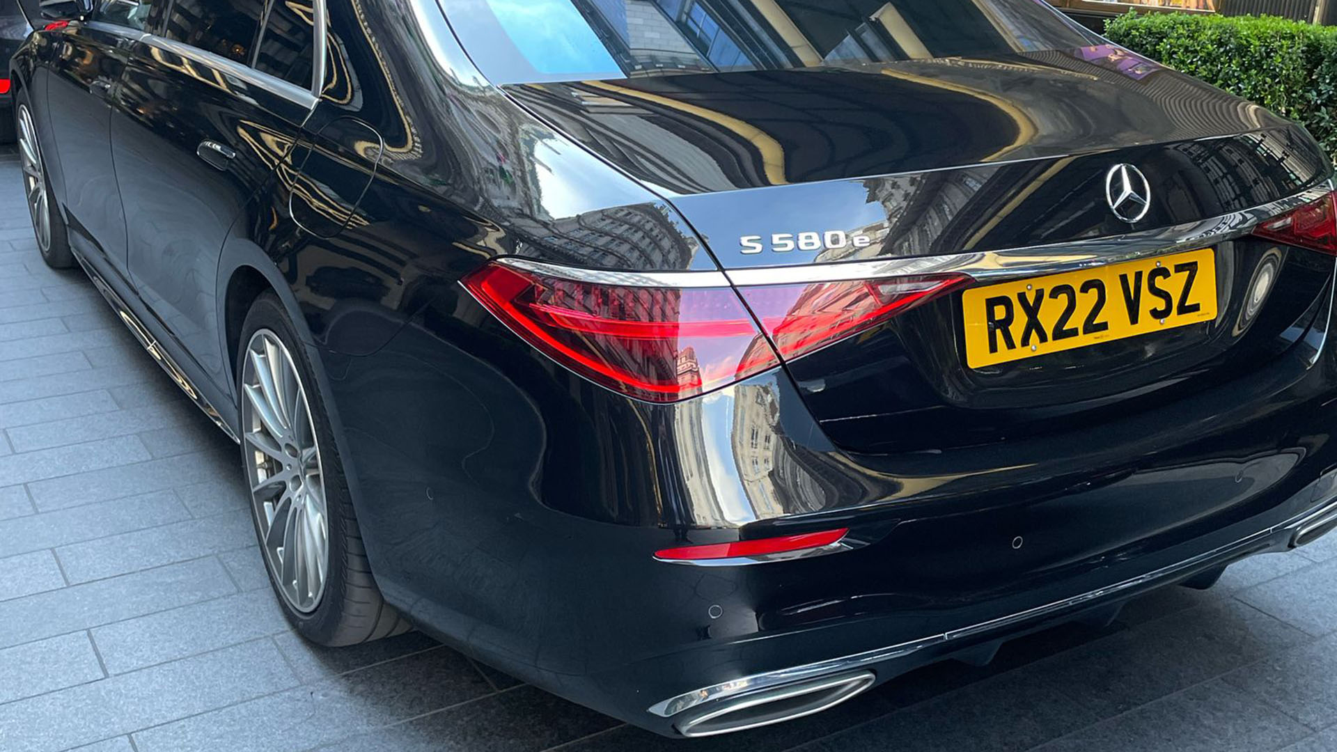 Rear view of Black Mercedes shwoing the S580e badge