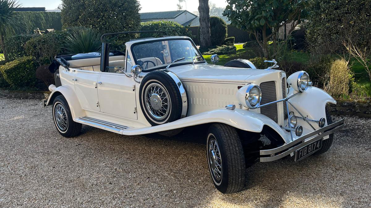 Vintage Beauford Wedding with convertible roof open